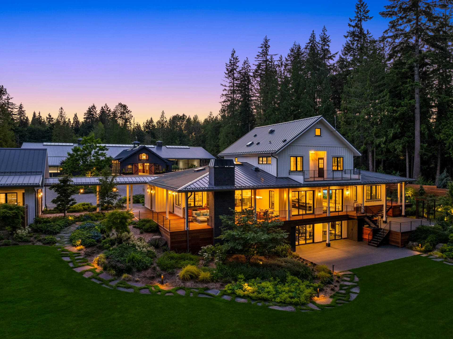 Farmstyle house. Outdoor drone shot. Twilight replacement.